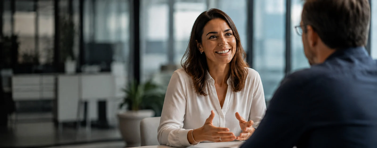 Client speaking with a professional in a corporate environment